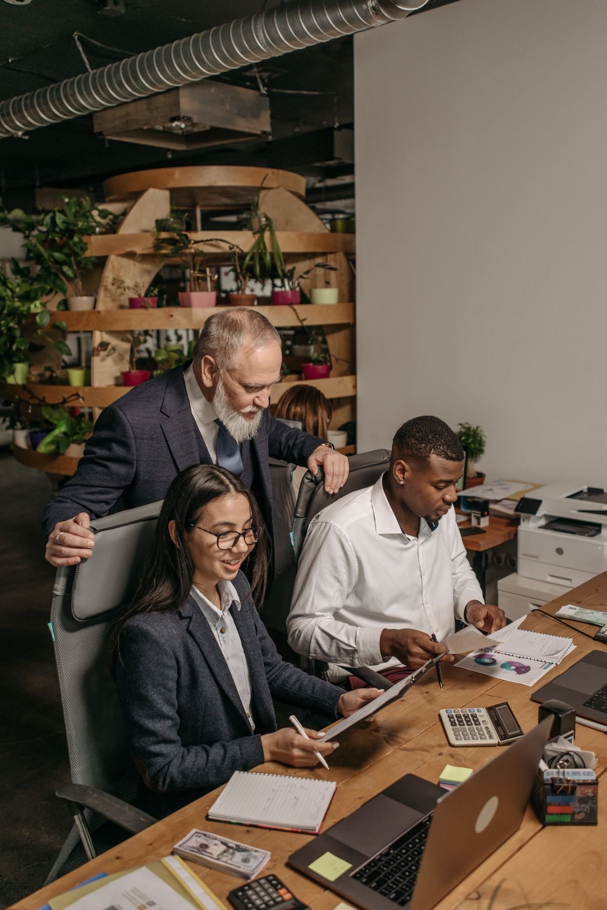 Colleagues collaborating around a digital product
